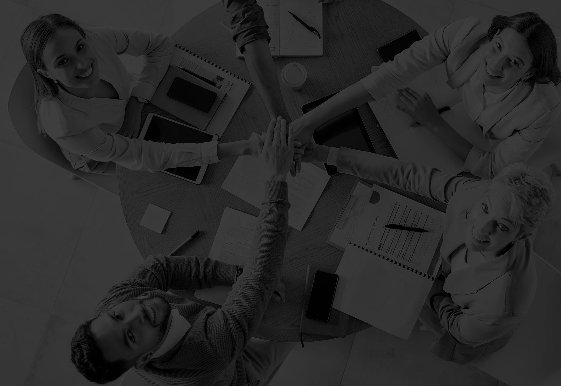 a team sitting around a table